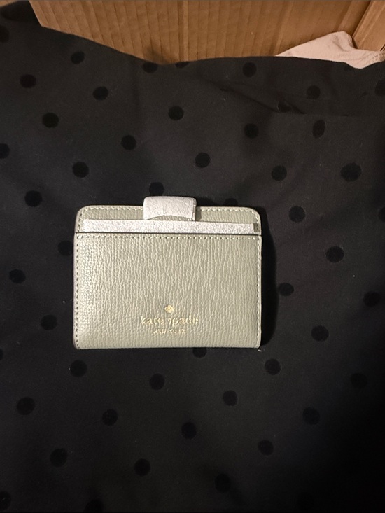 kate spade Handbags - kate spade mint green pebbled leather card with gold logo